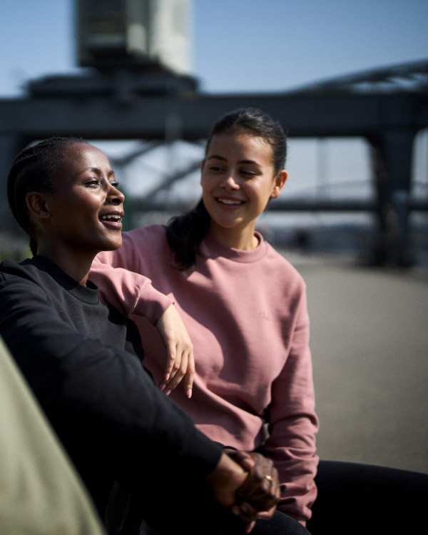 Two women smiling